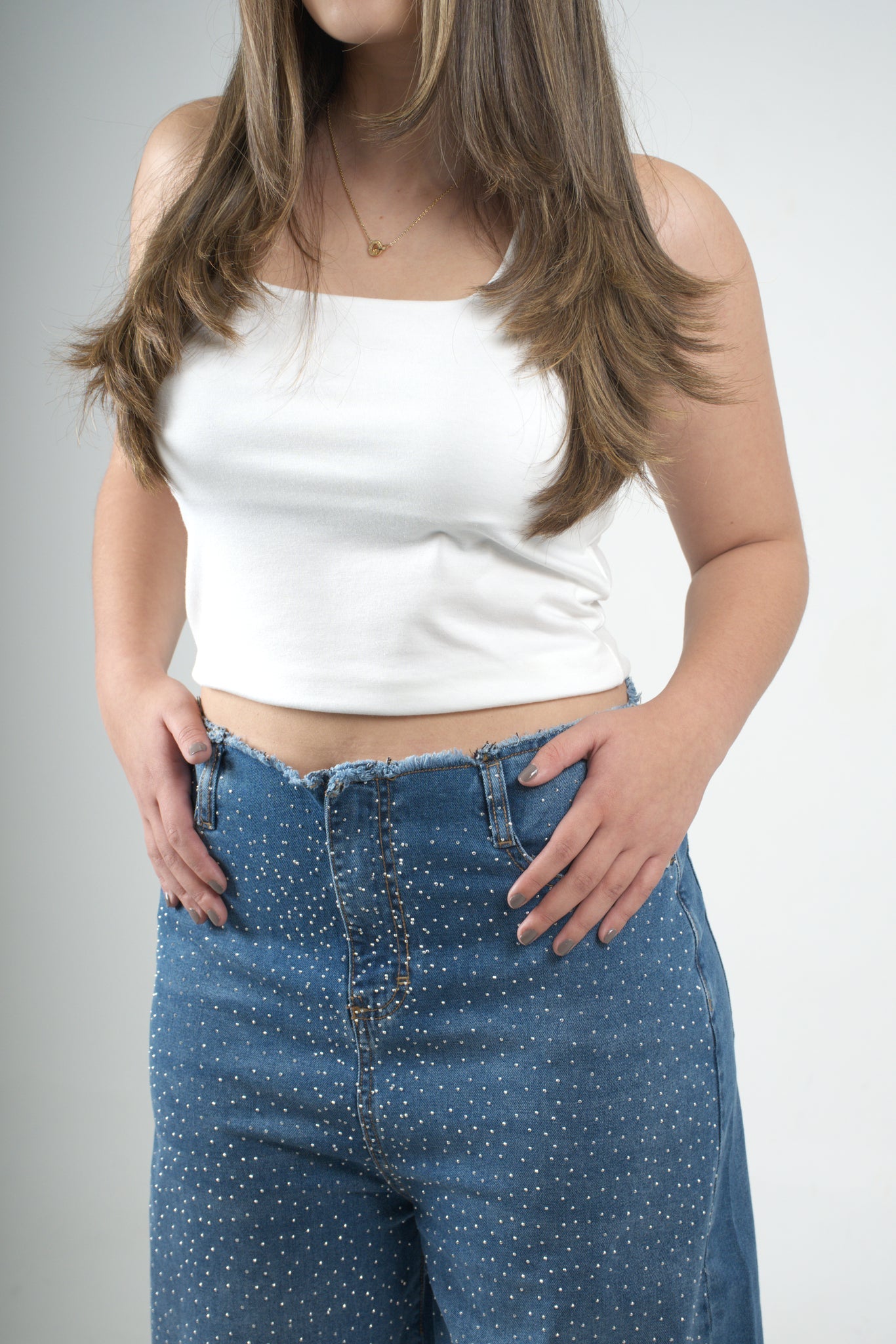 Blusa blanca sin mangas para mujer