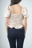 Blusa de flores beige para mujer