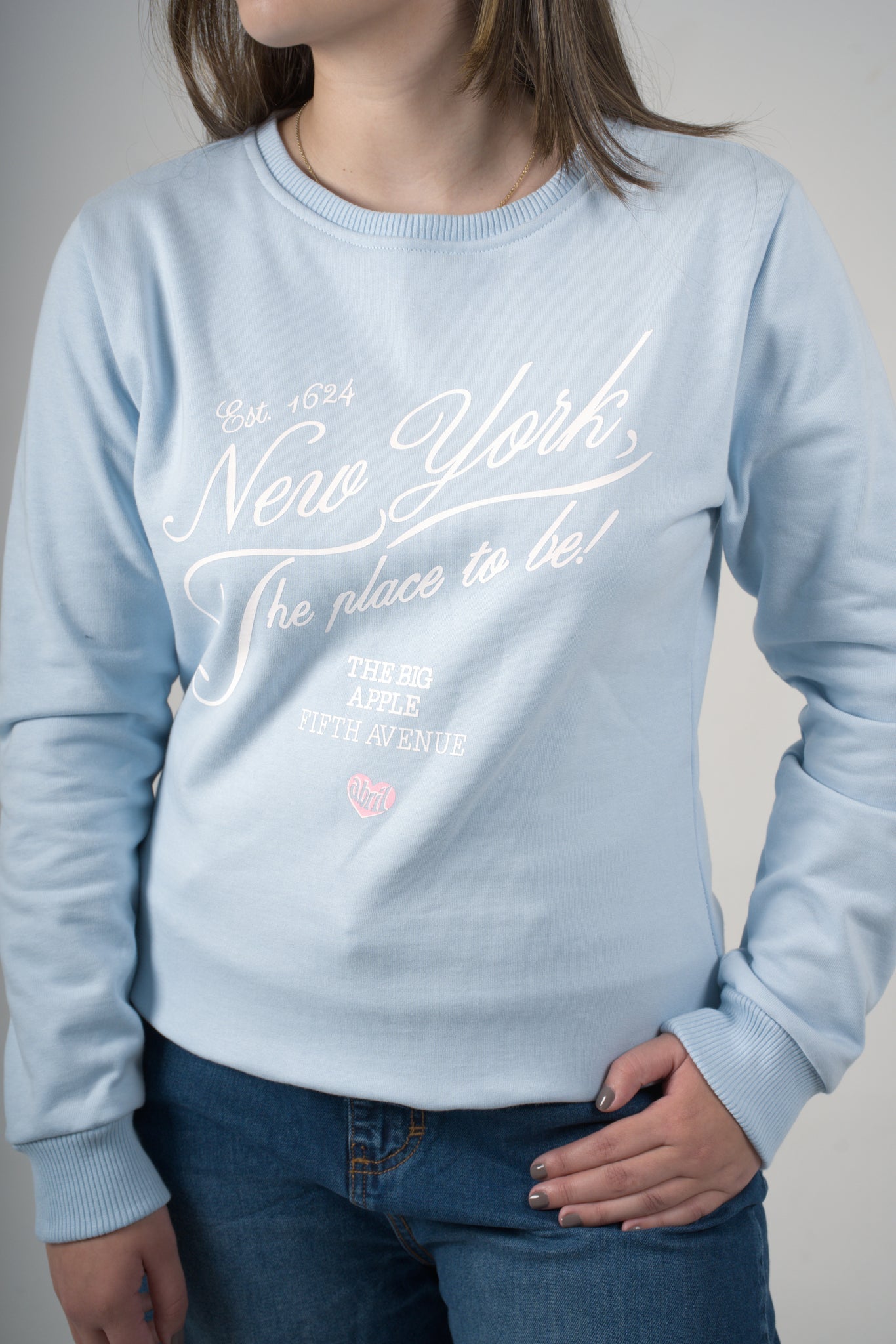 Buzo azul claro para mujer