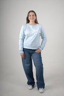 Buzo azul claro para mujer