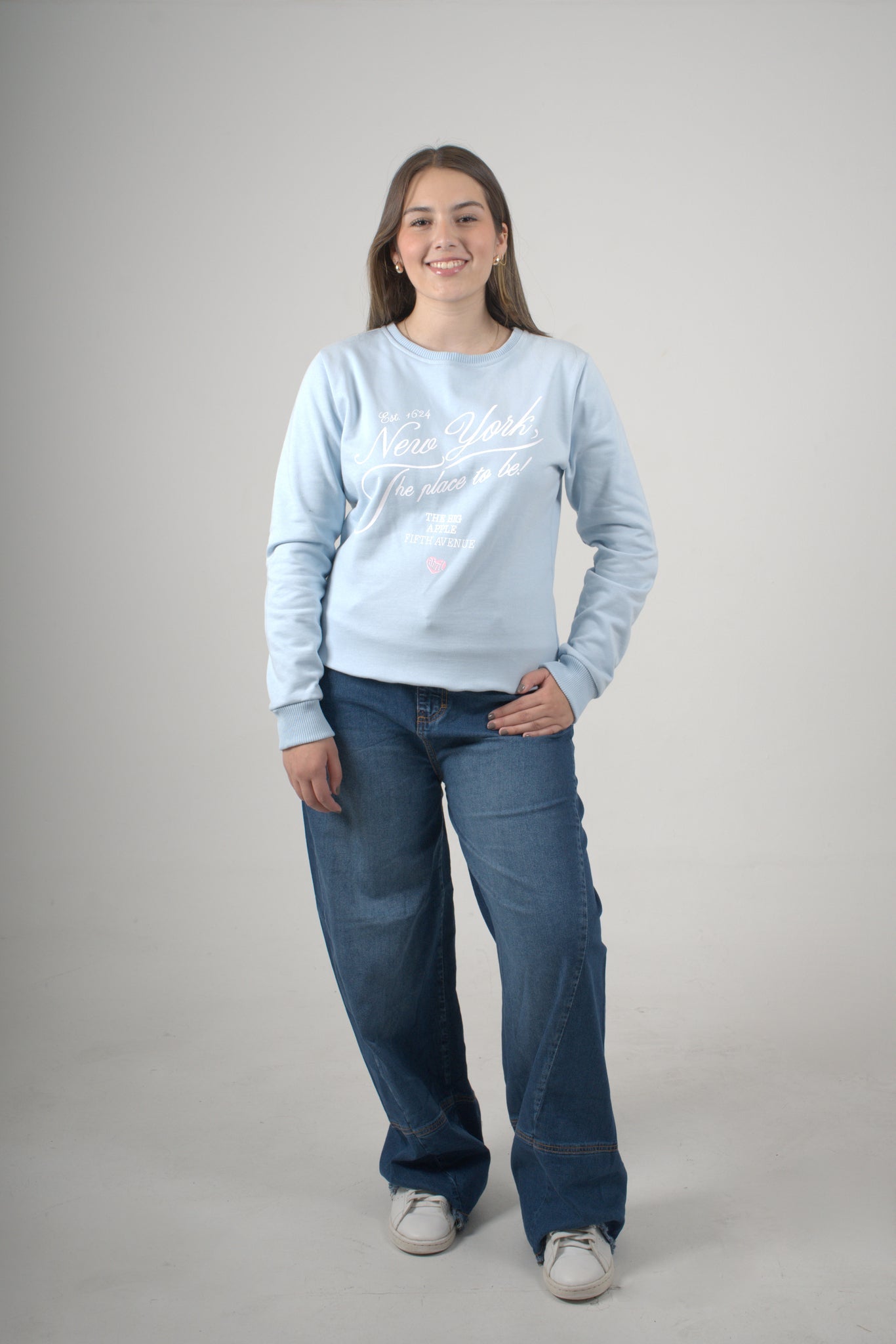 Buzo azul claro para mujer