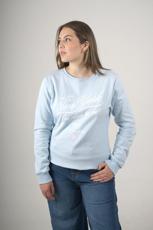 Buzo azul claro para mujer