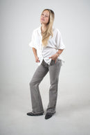Blusa blanca de corte suelto para mujer