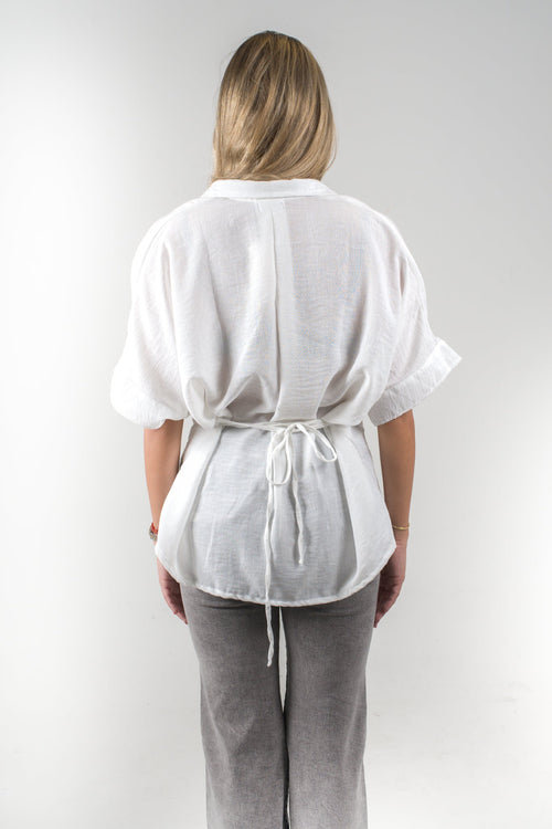 Blusa blanca de corte suelto para mujer